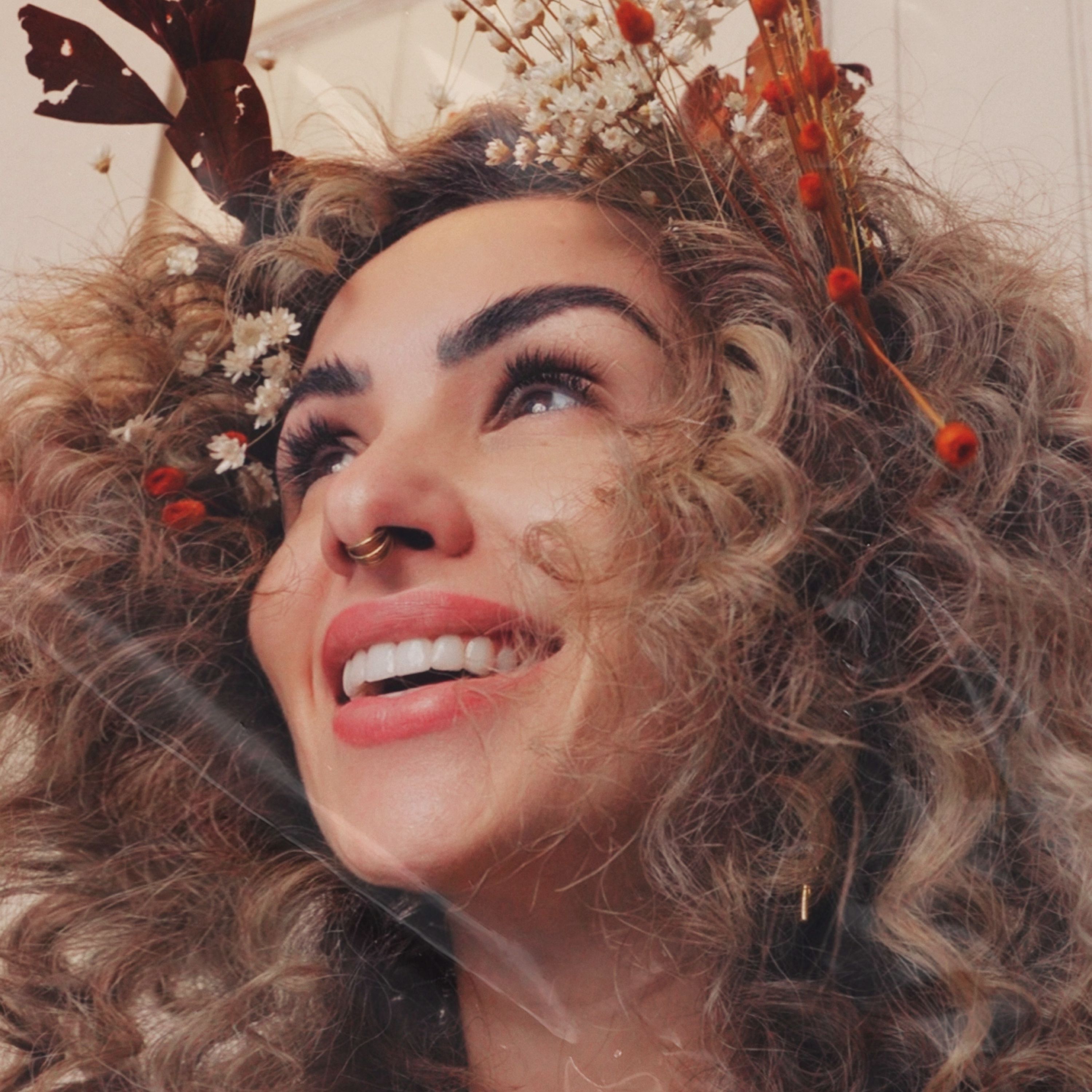 Kia Sajo — coroa de flores
